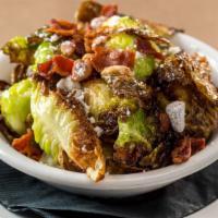 Brussels Sprouts · Gluten free. Served with bacon, house-candied pecans and goat cheese.