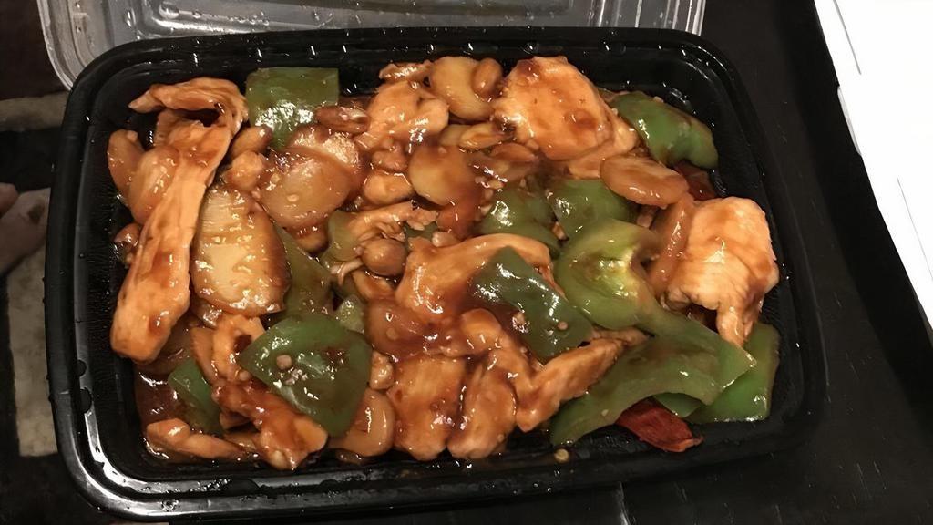 Kung Pao Chicken · Boneless chicken, bell peppers, peanut and water chestnuts stir fry with house special spicy brown sauce.