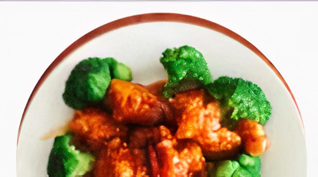 Sesame Chicken · Top item. Chicken with lightly battered and deep-fried, sautéed in spicy sesame sauce with some sliced broccoli and chop green onions.