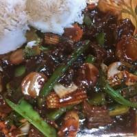 Basil Beef · Spicy. Beef with fresh mushroom, basil leaf, and jalapeno in oyster sauce.