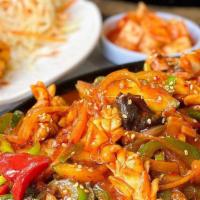 O Jing Uh Bokkeum / 오징어볶음 · Marinated squid and vegetables stir-fry with spicy sauce served with noodles