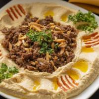Hummus With Protein  · Topped with gyro or chicken with pita.