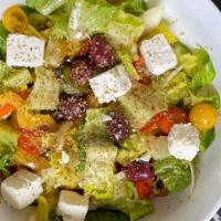 Greek Salad · Romaine lettuce, tomato, cucumber, onion, Kalamata olive, pepperoncini, feta cheese, fried p...