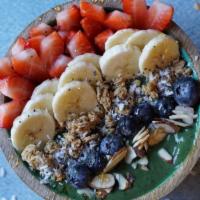 Earth Bowl · Kale, spinach, spirulina, moringa leaf, strawberries, banana, and almond milk; topped with g...
