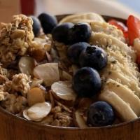 Power Bowl · Peanut butter, acai, blueberries, banana, pineapple, and almond milk, topped with granola, s...