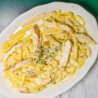 Fettuccine Alfredo · Romano cheese, cream sauce, and fettuccine. Add Grilled Chicken or Shrimp for an additional ...