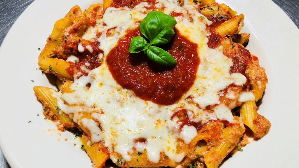 Baked Ziti · Penne noodles mixed with our tomato sauce and ricotta cheese, then topped with mozzarella cheese and baked to perfection. add spinach with an additional price.