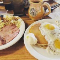 Deluxe Combo · This three egg combo is served with bacon, sausage, ham, two pancakes and hash brown.