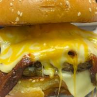 A1 Burger · This hearty, flavorful burger is loaded with cheddar, swiss and jack cheeses, topped with si...