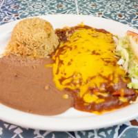 Enchilada Plate · Three cheese, beef, or chicken enchiladas. With a side of lettuce and tomato. Includes rice,...