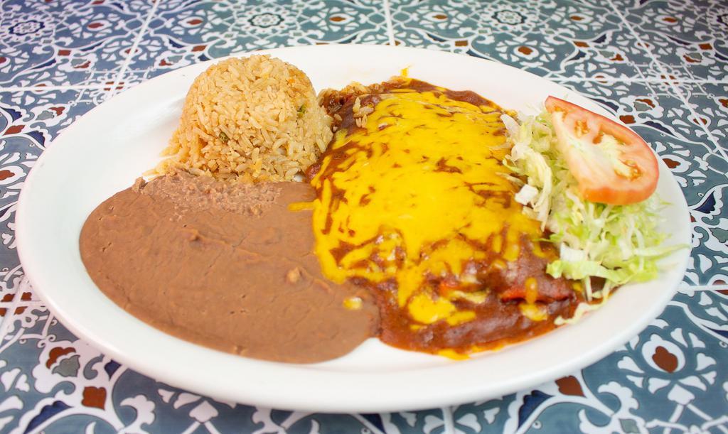 Enchilada Plate · Three cheese, beef, or chicken enchiladas. With a side of lettuce and tomato. Includes rice, beans and two tortillas.