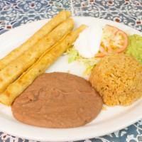 Flauta Plate · Three flautas served with guacamole, sour cream and salad. Includes rice, beans and two tort...