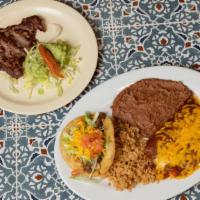 Deluxe Plate · Carne asada, two enchiladas, one (beef or chicken) puffy taco, and guacamole salad. Includes...