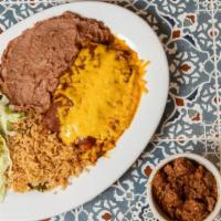 Enchiladas & Carne Guisada · Two cheese enchiladas and a portion of carne guisada with lettuce and tomato. Includes rice,...