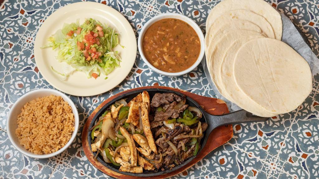 Fajita Family Order · One pound of chicken or beef fajitas, served with your choice of refried or charro beans, rice, guacamole salad, six tortillas and chips&salsa!