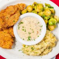 Southern Fried Chicken & Gravy · Boneless breast smothered in our sausage gravy with garlic mashed potatoes and seasonal vegg...