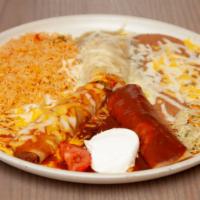 Enchiladas Tapatio · Combination of three enchiladas: one chicken, one cheese, and one shredded beef. Topped with...