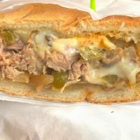 Italian Beef · Toasted hoagie dry or dipped in au jus. Sweet peppers and onions or hot peppers and onions.