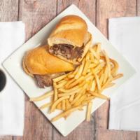 French Dip · Thinly sliced prime rib piled on a toasted hoagie covered with melted swiss cheese and serve...