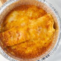 Enchilada · One enchilada of your choice (chicken, beef or cheese) topped with enchilada sauce and chedd...