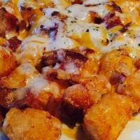 Loaded Tater Tots Or Fries · Tots with melted cheddar, bacon, and ranch.
