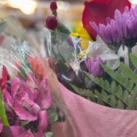 Assorted Blooms · Flowers and/or vase/container may vary depending on the season and availability.