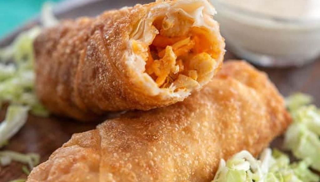 Buffalo Chicken Egg Rolls · Filled with fully-cooked chicken slices, melty mozzarella cheese, and spicy buffalo sauce. Crunchy egg roll wrapper on the outside pair with blue cheese or ranch dressing.