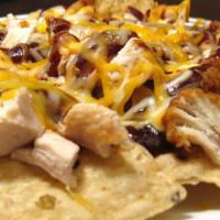 Bbq Chicken Nachos · Topped with Breaded Chicken and BBQ Sauce
