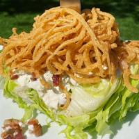 Wedge Salad · Iceberg lettuce, white balsamic dressing, bleu cheese dressing, bleu cheese crumbles , bacon...