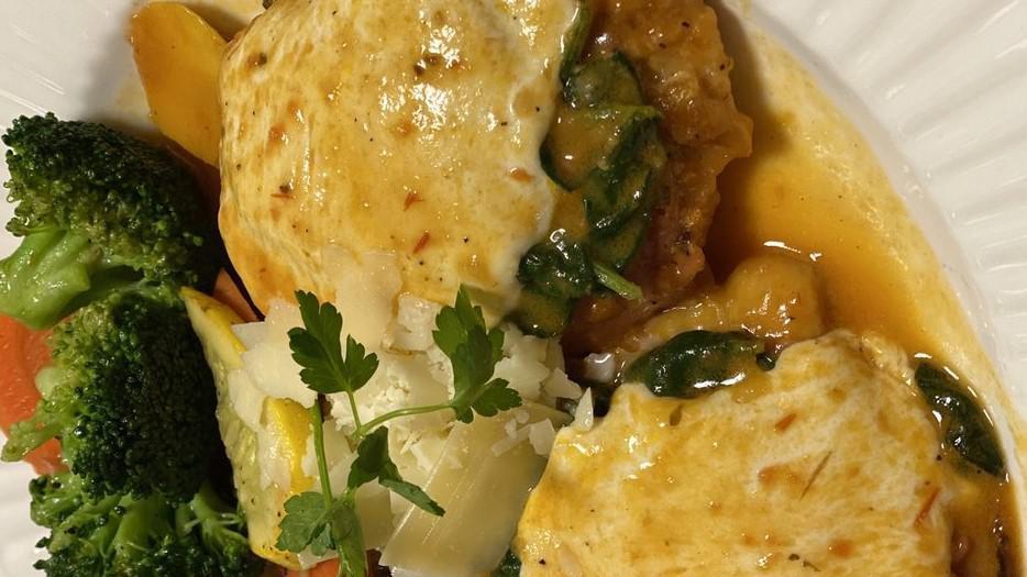Chicken Saltimbocca · pan seared chicken with prosciutto, spinach & fresh mozzarella combined with marsala wine cream sauce.