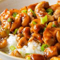 Chicken With Cashew Nuts · Served with white rice.