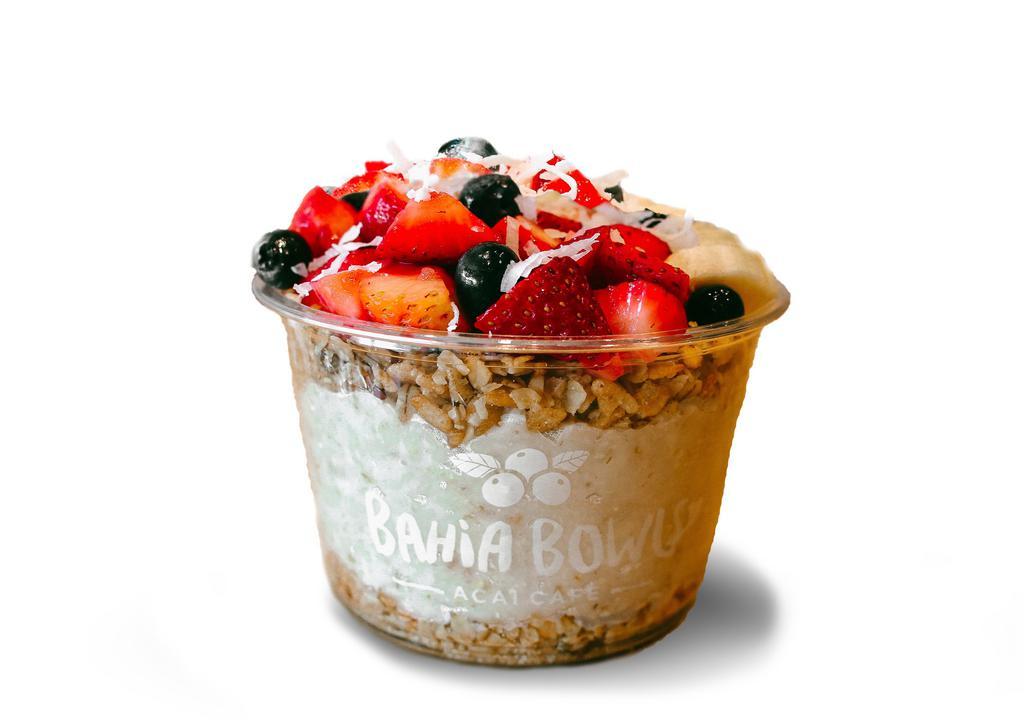 Oatmeal Bowl · Whole grain oatmeal, granola, strawberries, banana, blueberries, coconut flakes, and honey.