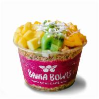 Pitaya Bowl · Pitaya (dragon fruit) base topped with granola, mango, pineapple, kiwi, coconut shavings, an...