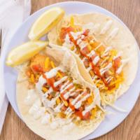 Tin Fish Fried Fish Taco · Our signature fish taco! Fried fresh cod, on a warm flour tortilla with fresh green cabbage,...