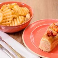 Tin Fish Lobster Roll With Fries · Butter grilled lobster with Italian parsley, sizzled with lemon squeeze, tucked to a warm br...