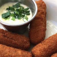 Croquetas · Homemade ham and chicken croquettes. Served with garlic aioli sauce.