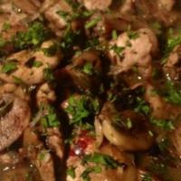 Setas Al Ajo · Fresh mushrooms sautéed in extra virgin olive oil, garlic, lemon juice, white wine, red pepp...