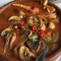 Pollo A La Diabla · Chicken sautéed in spicy creole sauce, mushrooms, onions, peppers and Spanish white wine. Se...