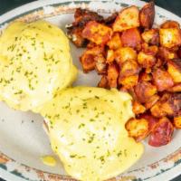 Eggs Benedict & Home Fries · traditional eggs Benedict with Canadian bacon