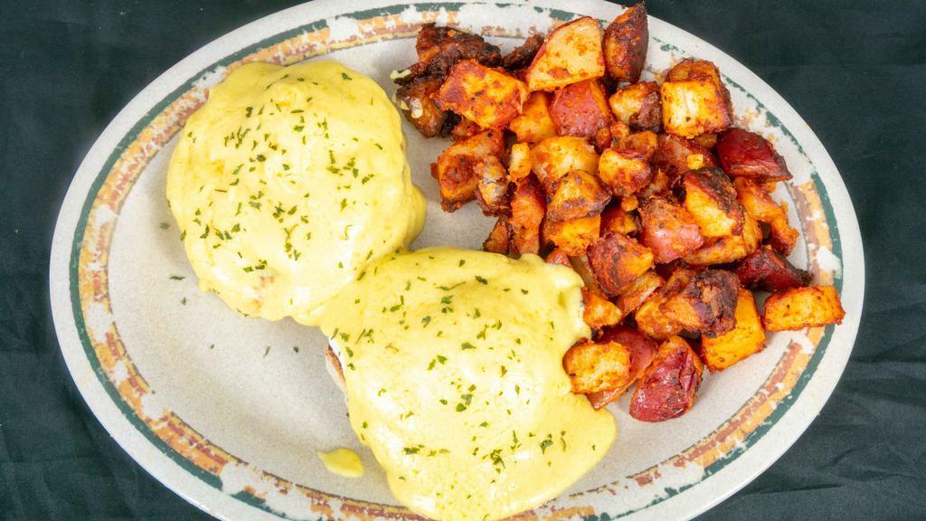 Eggs Benedict & Home Fries · traditional eggs Benedict with Canadian bacon
