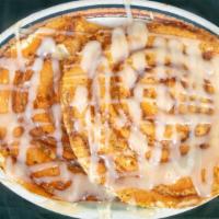 Cinnamon Roll Pancakes · Egg's Up favorite! Two pancakes blended with cinnamon and sugar and topped with a cream chee...