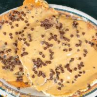 Reese'S Peanut Butter Pancakes · Two pancakes filled with chocolate chips and Reese’s peanut butter.