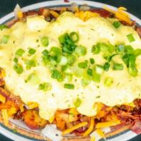 Loaded · Egg's Up favorite. Oh yes we did! Original home fries loaded with bacon bits, onions, chedda...