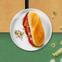 Italian Sub · Sliced ham, salami and pepperoni with lettuce and tomato. Served on freshly baked toasted br...