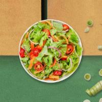 Garden Salad · Green salad with mixed vegetables tossed with your choice of dressing.