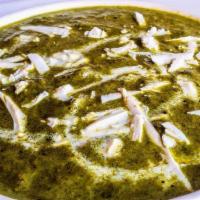 Saag Paneer · Homemade cheese and spinach simmered in a cream sauce.