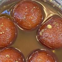 Gulab Jamun · 3 pieces. Homemade mild and flour dumplings in warm sweet syrup.