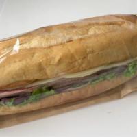 3 Meat Hoagie · 9 Inch Turkey, Ham, Salami and Provolone  Cheese with Lettuce and Red onions on Soft Hoagie ...