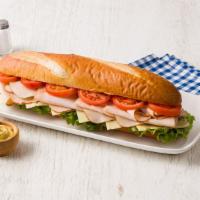 Signature Café All American Turkey Sub · Primo Taglio Oven Roasted Turkey Breast, Swiss Cheese with Lettuce and Mayonaise on Fresh Ba...
