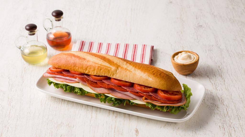 Signature Café All American Italian Sub · Primo Cooked Ham, Margherita Pepperoni, Margherita Hard Salami, Primo Provolone Cheese with Lettuce and Mayonaise on Fresh Baked French Bread